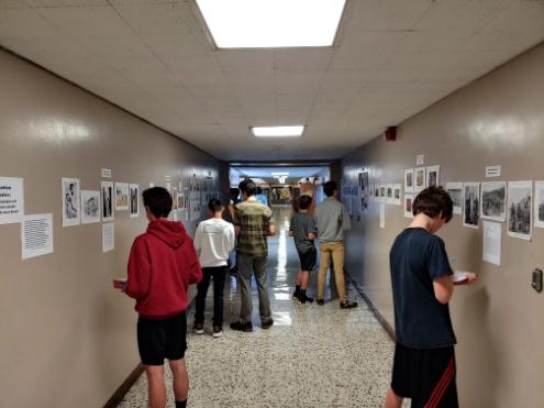 Students assembling the exhibit