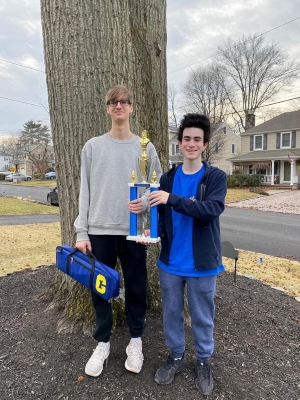 Ethan Lanier and Zach Epstein with their height difference and trophy