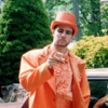 Mr. Brennan is dressed in an entirely orange suit. I do not know why.